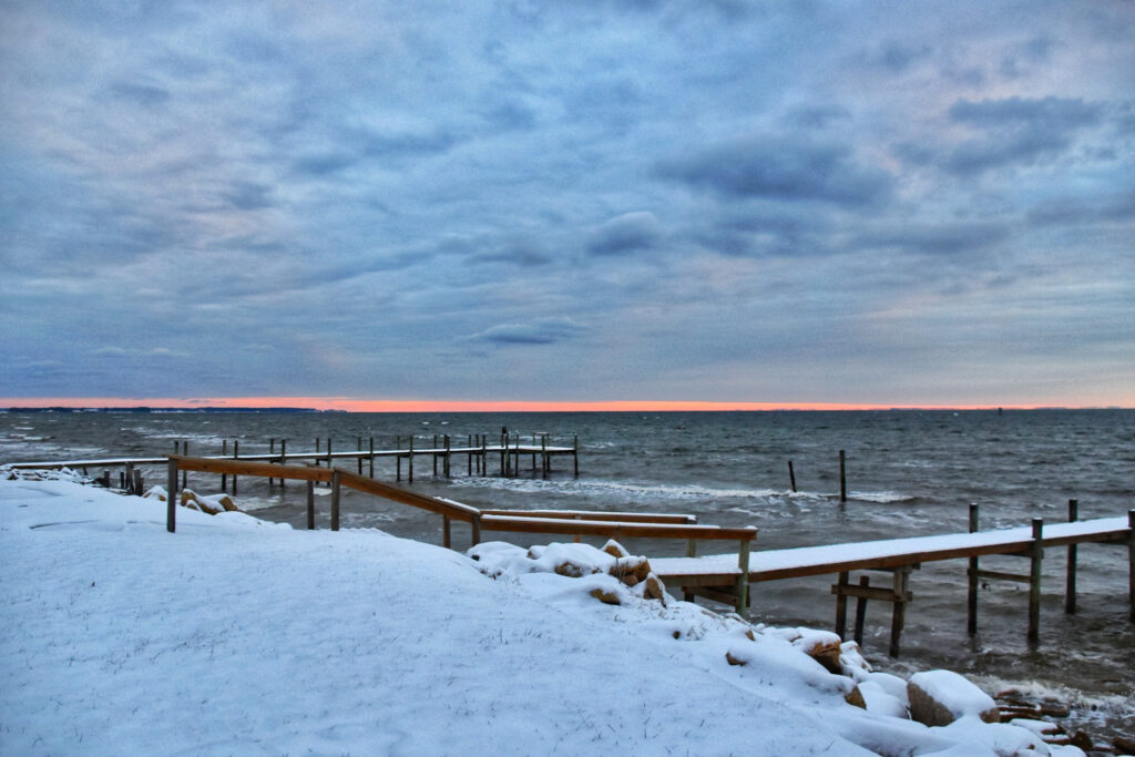 Snowfall and fishing piers in Maryland for winter-marine-construction-anne-arundel-county blog.